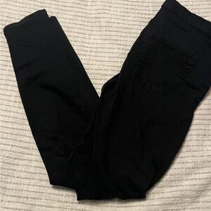 Black distressed skinny‎ jeans